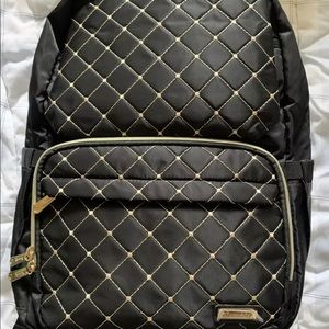 bamomby backpack and baby items.